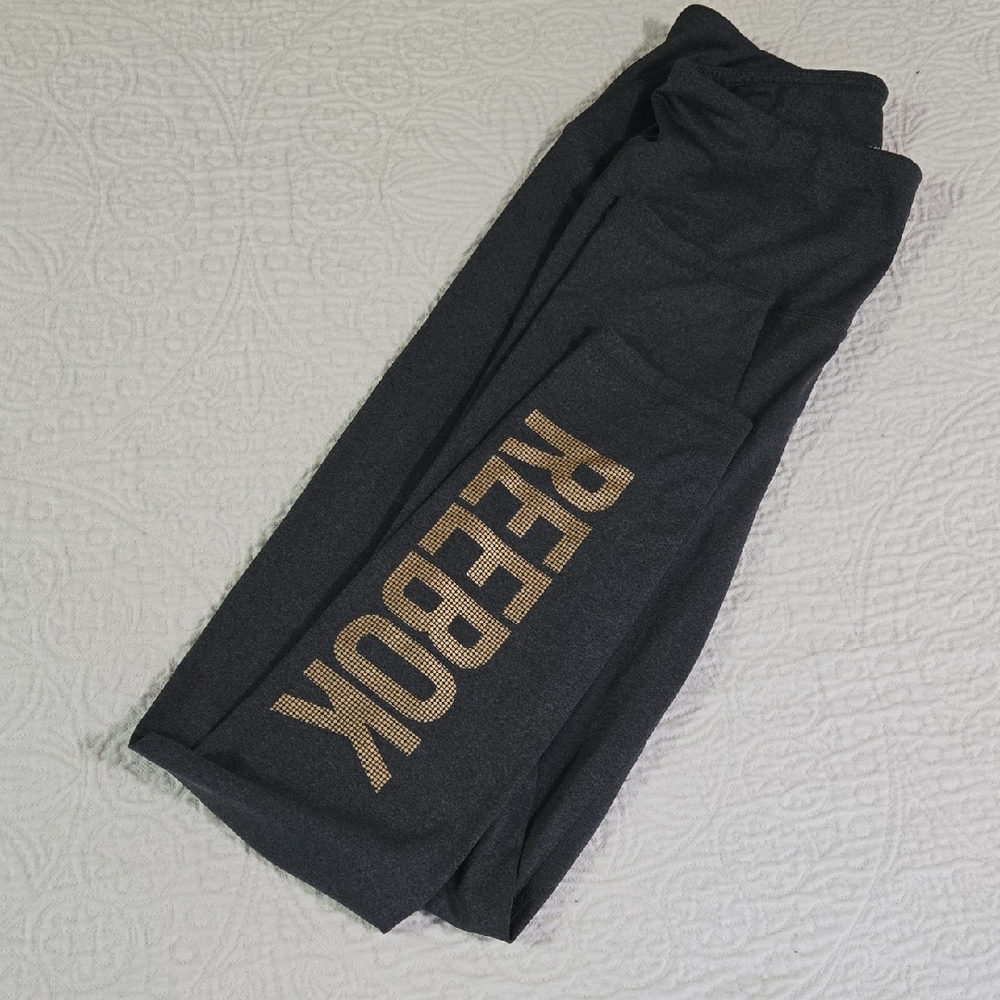 Reebok Women's Black and Gold Leggings